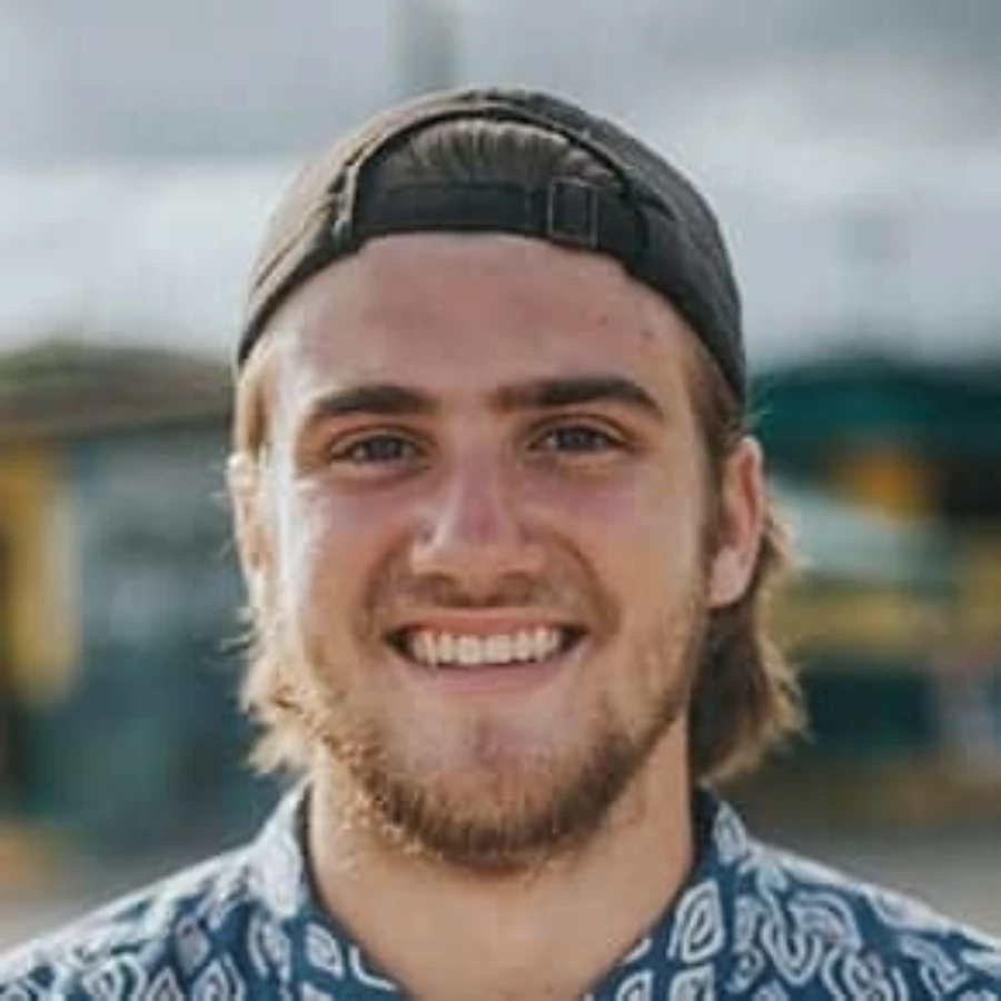 Joseph Egan - friendly young man smiling confidently outdoors in casual attire
