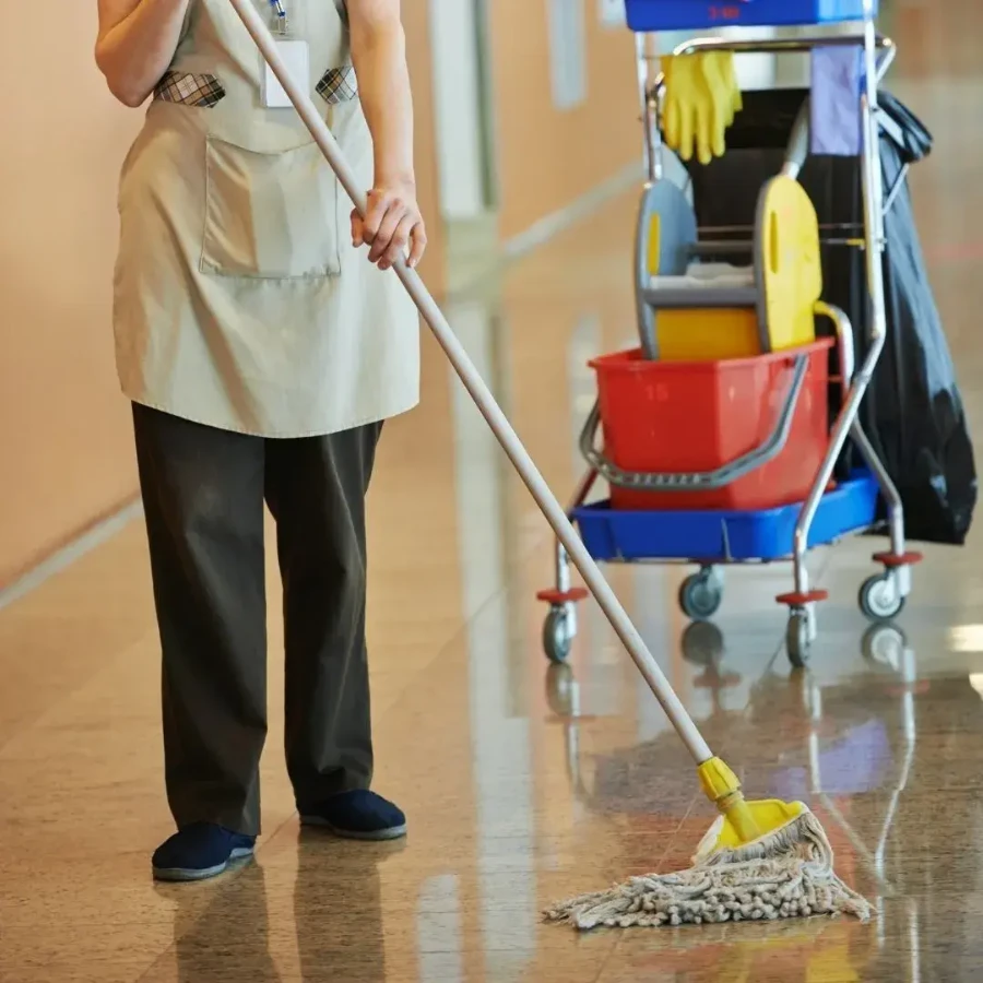 House Cleaning, Downtown Fort Myers, FL, professional maid mopping hallway floor